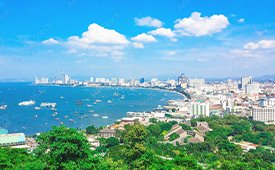 Pattaya city sign and coastal greenery